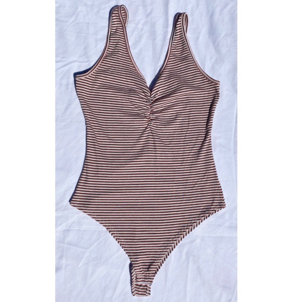 Pink, white, and black stripped bodysuit 😻
